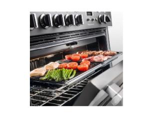 Falcon Professional+ FX 90 single cavity grill with fish, bacon, sausages, asparagus and tomatoes